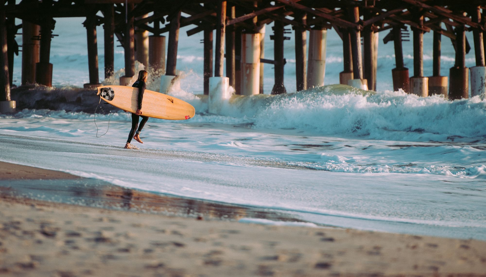 Hitting the waves surfer