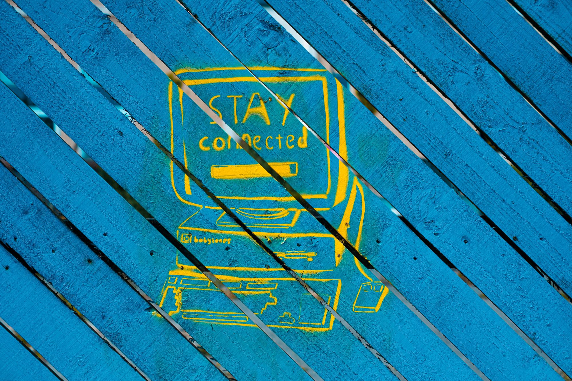 Stay connected sign on wall
