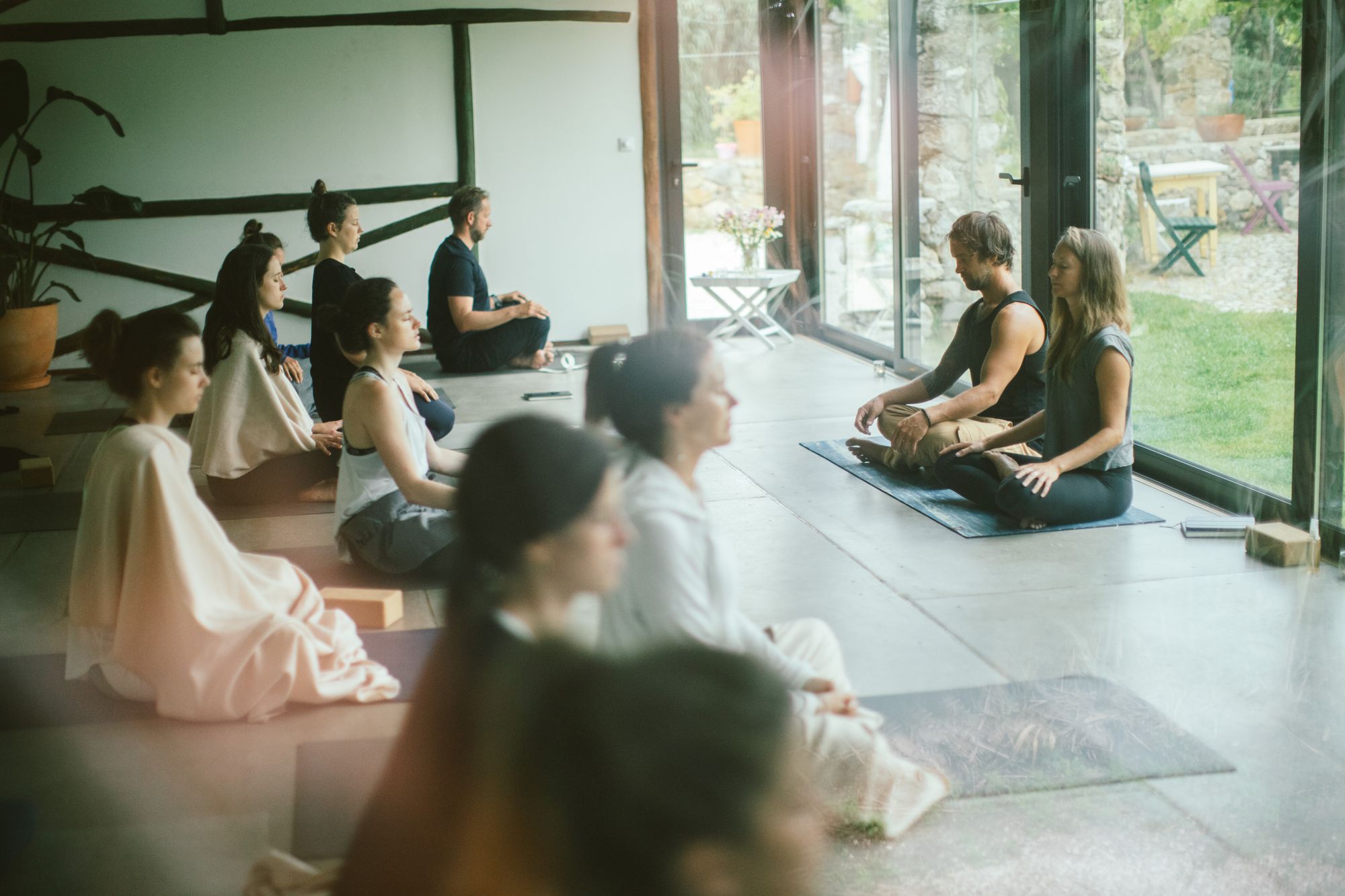 Lisa Andersson Rhodiner and partner at a Vinyasa yoga retreat 