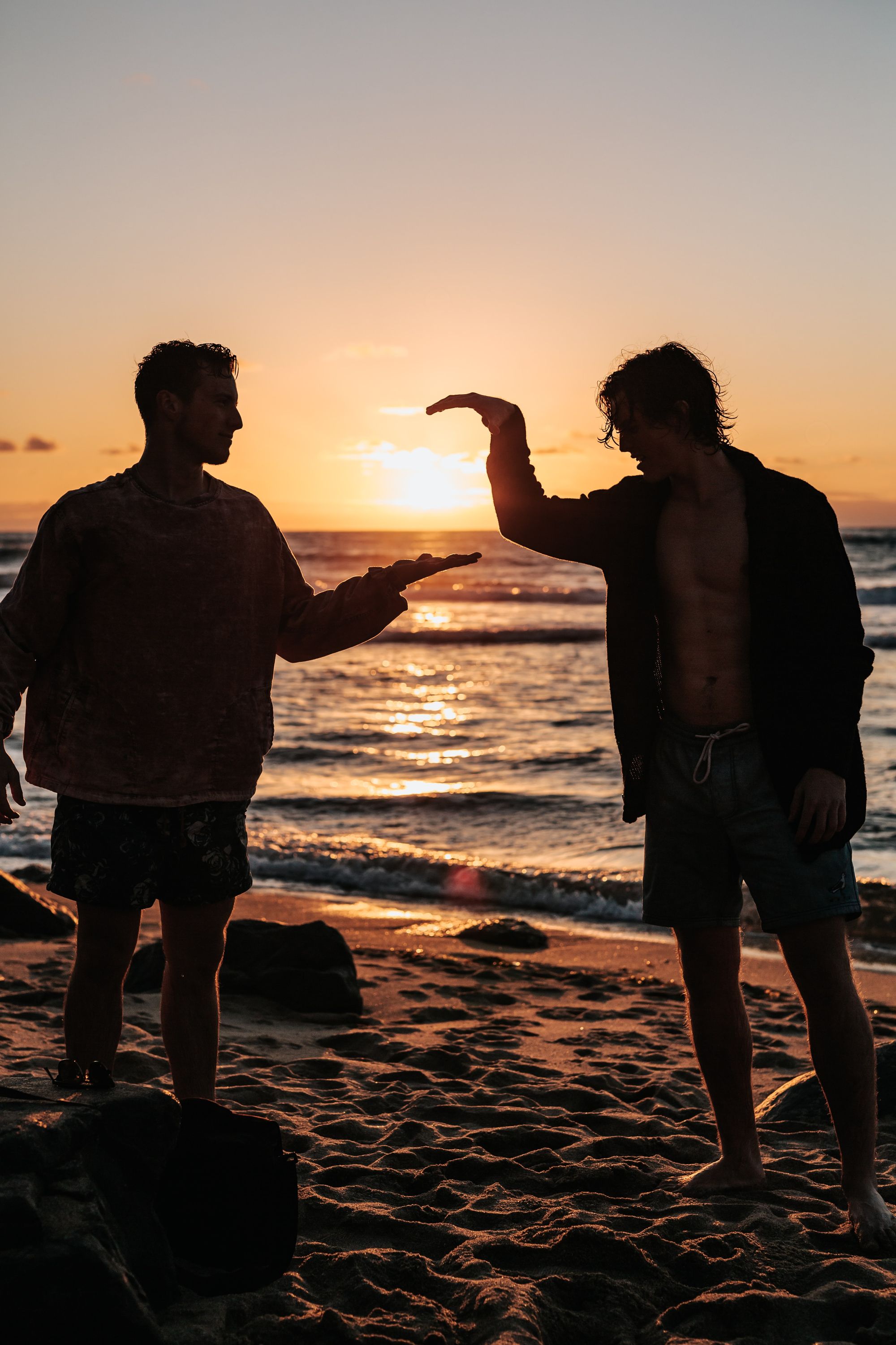 two guys highfiving to strengthen their relationship